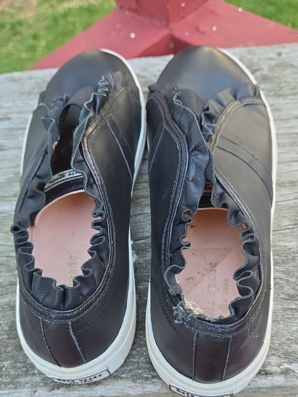 kate spade Lance Black Ruffle-Trim Slip-On Sneakers